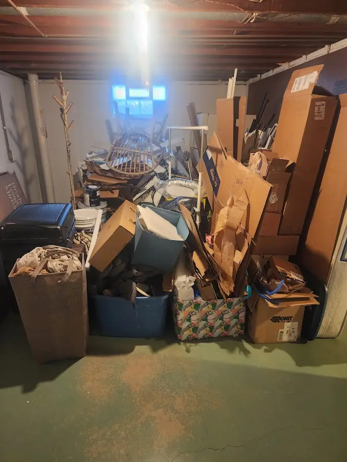 Roll-off dumpster container at job site for Yard Waste Dumpster Rental in Oconto Falls